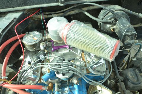 1979 Ford Bronco - Close-up view of a vehicle's engine bay, showing the air intake and other engine components.