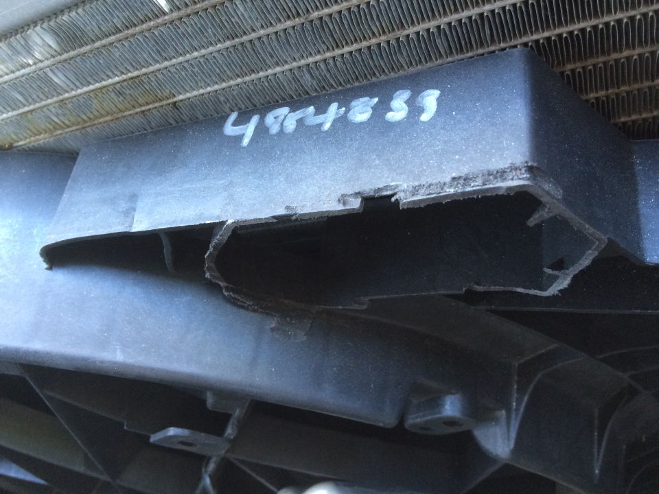 Radiator fan shroud with handwritten numbers 4824853