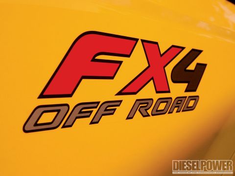 1996 Ford Bronco - Close-up of an FX4 Off Road decal on a yellow vehicle.