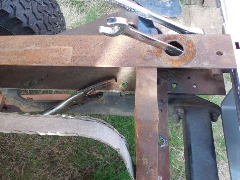 1993 Ford Bronco - The hitch receiver's rear bolt holes line up with the previously-drilled holes in the frame, and the others are far enough away that I won'…
