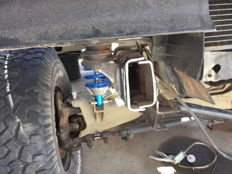 1995 Ford Bronco - Front suspension components and tire are visible in this close-up view.