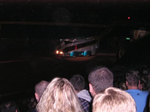 1996 Ford Bronco - A custom-built truck with a unique, futuristic design is displayed under dim lighting.