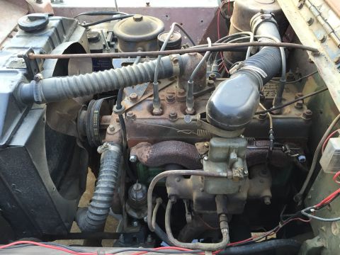 1946 Jeep CJ5 - Close-up view of an engine compartment, showing various mechanical components and wiring.