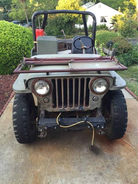 1946 Jeep Willys - 1945 Jeep Willys CJ-2A front view, showing its iconic grille and front bumper.
