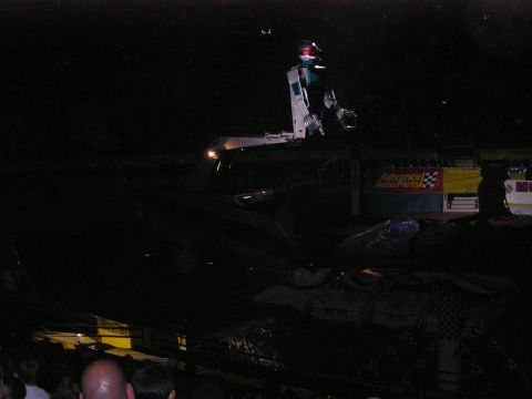 1996 Ford Bronco - Monster truck on display at an event, with "Advance Auto Parts" signage visible.