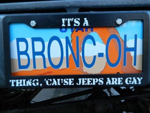 1979 Ford Bronco - Custom license plate with a personalized message about Broncos and Jeeps.