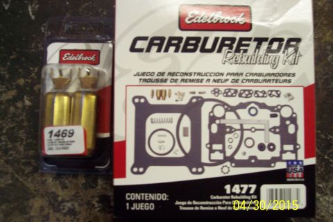 1973 Ford F-250 - Two Edelbrock carburetor rebuilding kits are displayed, one in packaging and the other in its box.