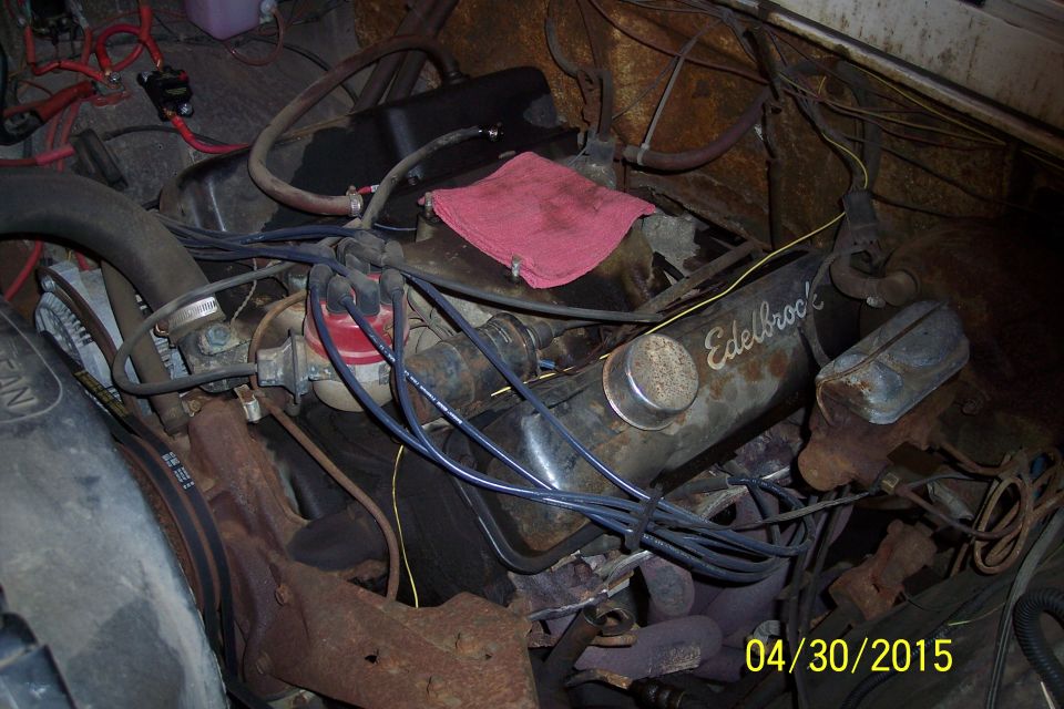 Engine bay with Edelbrock valve covers and red rag