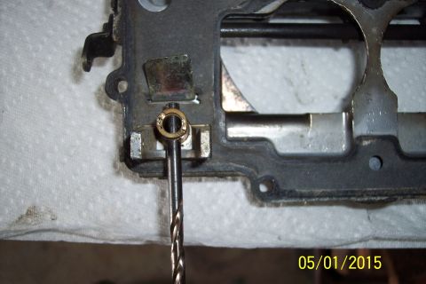 1973 Ford F-250 - Close-up of a carburetor component being worked on, with a date stamp in the corner.