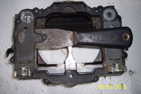 1973 Ford F-250 - Carburetor part shown with a Hyde tool, a visible date code of 6 03 97.