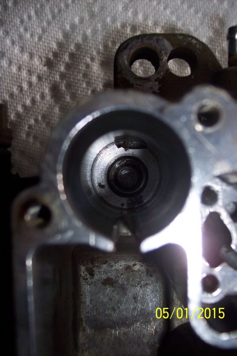 1973 Ford F-250 - Close-up view inside a carburetor, showing internal components and wear. The image is dated 05/01/2015.