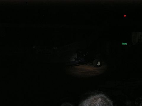 1996 Ford Bronco - An ATV is visible in the dark, lit by a spotlight.