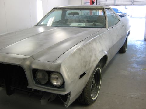 1973 Ford Ranchero - This car, likely a 1972 Ford Ranchero, is undergoing restoration and is shown in primer.
