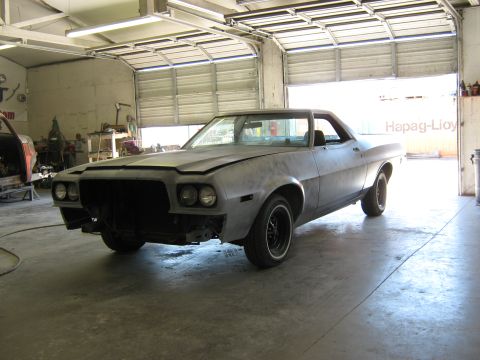 1973 Ford Ranchero - This 1973 Ford Ranchero is undergoing restoration work in a garage setting.