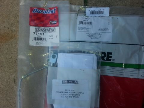 1996 Ford Bronco - Packaging for brake hoses and Duralast parts, with one label specifying fitment for 1978-79 Ford Bronco and 1973-79 Ford Truck.