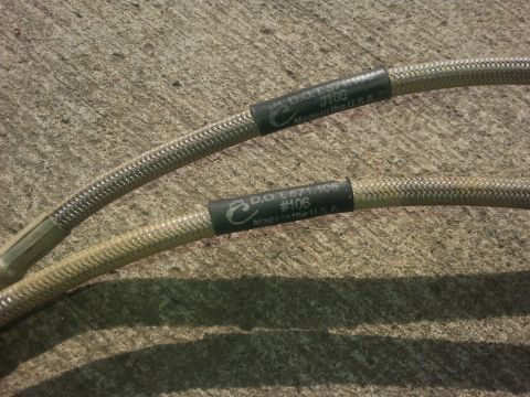 1996 Ford Bronco - Braided brake hoses with DOT certification markings.