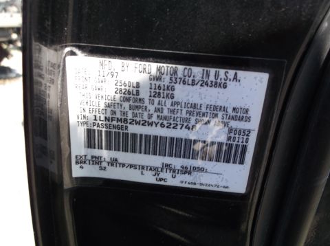 1999 Mercury Grand Marquis - This vehicle identification sticker provides manufacturing details and VIN for the car.