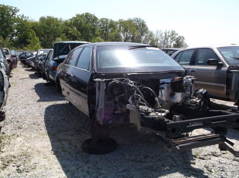 1999 Mercury Grand Marquis - This 1999 Mercury Grand Marquis is missing its front end and appears to be in a junkyard.