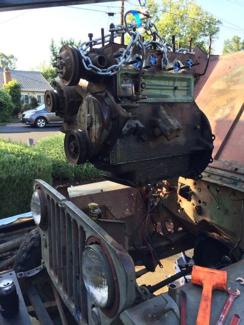 1946 Jeep Willys - Engine removal in progress on a vintage Jeep CJ5.
