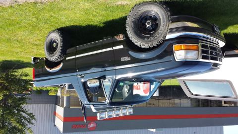 1995 Ford Bronco - This black Ford Bronco appears to be a 1992 model, not a 1995 as claimed.
