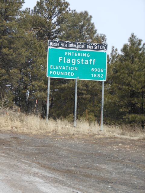 1995 Ford Bronco - A sign welcomes visitors to Flagstaff, Arizona, a city recognized for its dark skies.