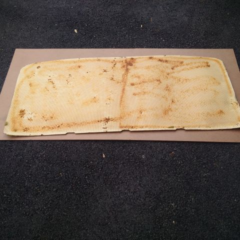 1978 Ford Bronco - This stained headliner is a part removed from a vehicle.