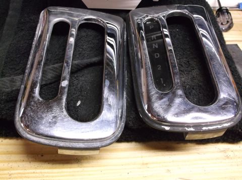 1999 Mercury Grand Marquis - Two chrome shifter console trim pieces are shown, one with a visible gear indicator.