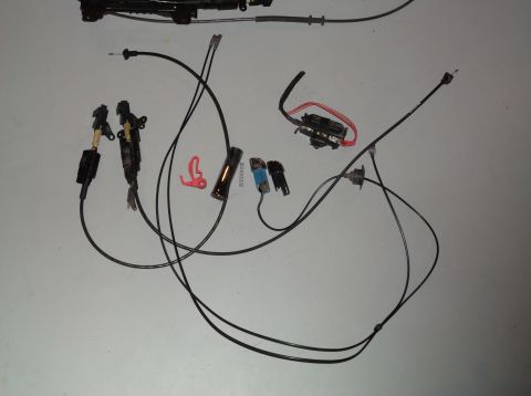 1999 Mercury Grand Marquis - Various automotive cables and electrical components are displayed, likely for a console or interior system.
