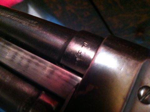 1985 Ford Bronco - Close-up view of a firearm barrel showing the caliber marking 'F 308'.