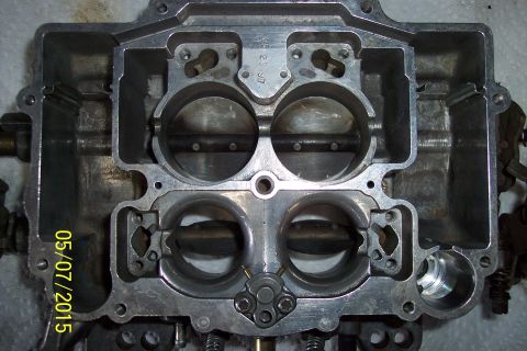 1973 Ford F-250 - Close-up view of a carburetor's internal structure, with a visible date stamp.