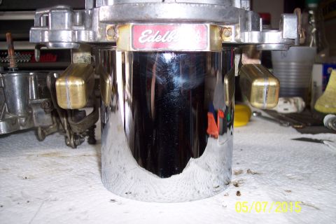 1973 Ford F-250 - This is a close-up view of an Edelbrock carburetor, likely undergoing maintenance or rebuild.