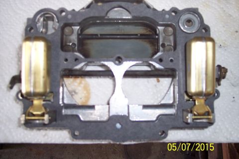 1973 Ford F-250 - Close-up of a carburetor part, showing brass floats and a gasket, with a date stamp of 05/07/2015.