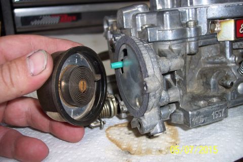 1973 Ford F-250 - Disassembled carburetor part with visible part number 1406.