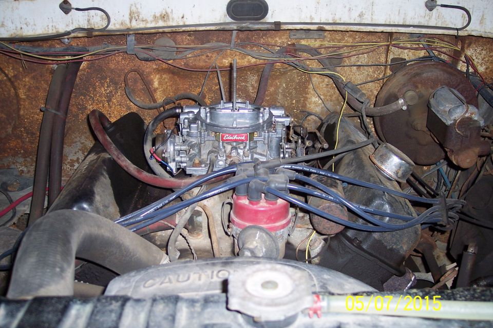 Edelbrock carburetor and engine components in a vehicle
