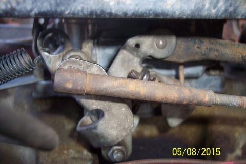 1973 Ford F-250 - A close-up view of the carburetor linkage and associated components.