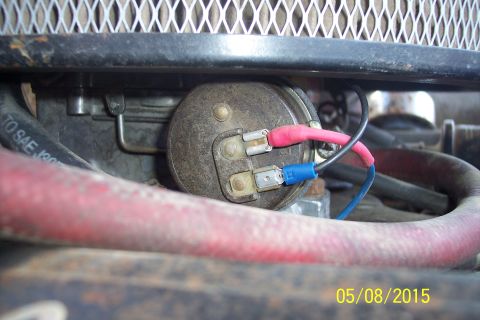 1973 Ford F-250 - Close-up view of an engine component with electrical connections, possibly part of a carburetor or ignition system.