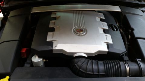 2008 Cadillac CTS - Close-up view of a Cadillac engine, showing the engine cover and air intake system.