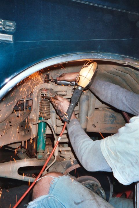 1988 Ford Bronco - The nut on the top of the old shock was stripped and wouldn't come off. So Shane "persuaded" it to come off.