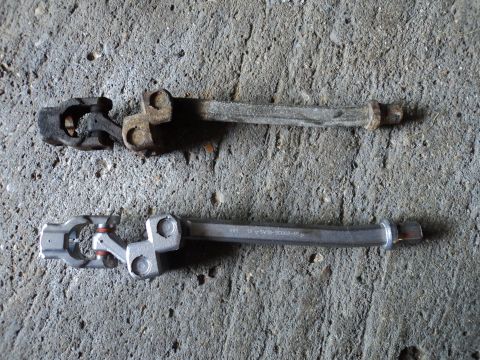 2004 Mercury Grand Marquis - Comparison of a worn steering shaft universal joint with a new replacement part.