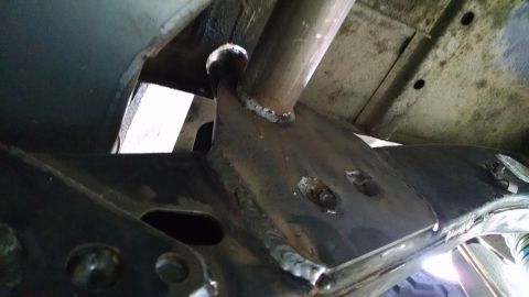 1985 Jeep CJ7 - This photo shows a close-up view of welded metal components on a vehicle's undercarriage.