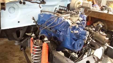 1978 Ford Bronco - Engine and suspension components are visible in this garage setting.