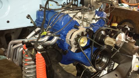 1978 Ford Bronco - Engine components, including headers and alternator, are visible in this close-up shot.