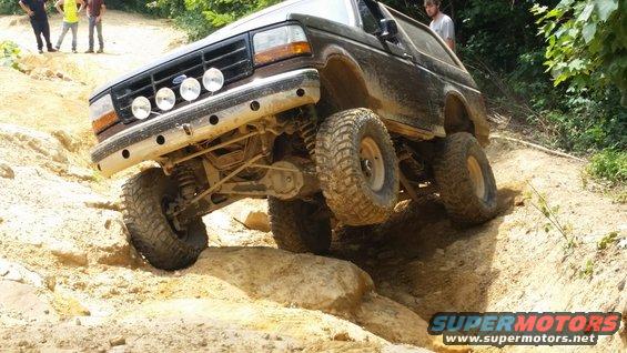 1992 Ford Bronco navigating rocky terrain