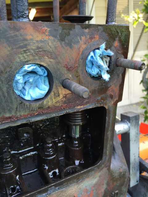 1946 Jeep Willys - Engine block with rags in cylinders, showing internal parts.