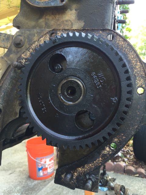 1946 Jeep Willys - A close-up view of a gear assembly, possibly from an older vehicle's engine, with visible part numbers.