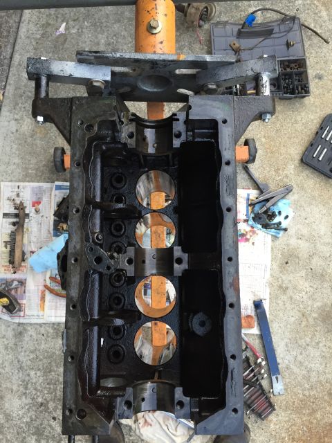 1946 Jeep Willys - Disassembled engine block on an engine stand, awaiting rebuild or repair.