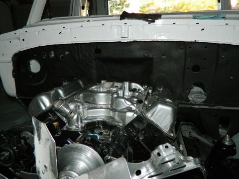 1979 Ford Bronco - Engine bay of a vehicle undergoing restoration, showing a polished V8 engine and associated components.