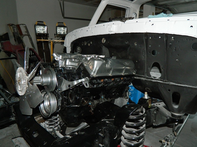 Engine and chassis of a 1979 Ford Bronco during restoration