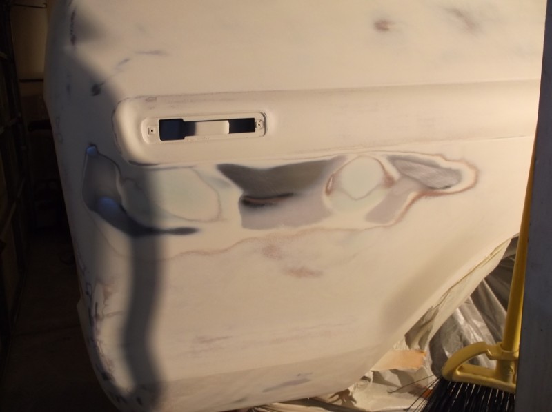 Rear quarter panel with body filler and primer