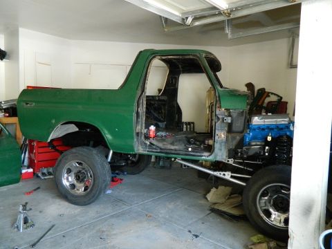 1979 Ford Bronco - This 1979 Ford Bronco is shown in a garage, partially disassembled for restoration work.